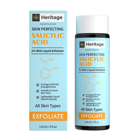 Heritage 2% BHA Liquid Exfoliant in een transparante fles, speciaal voor grove poriën, roodheid, ontstekingen en het verwijderen van dode huidcellen.